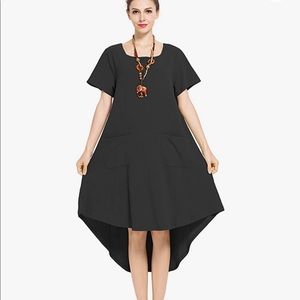 Gorgeous Linen and Cotton dress with asymmetrical cut hem.